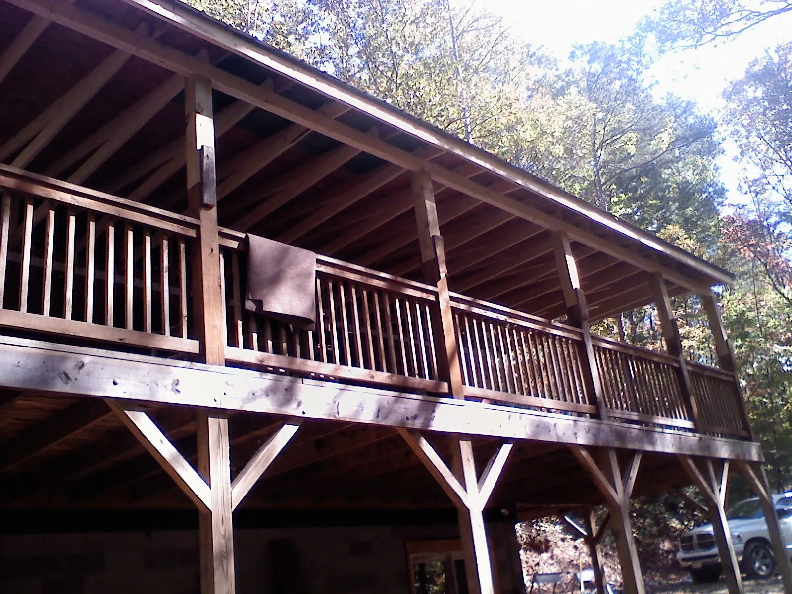 Timber framing under a new elevated porch and deck — Roof Leak Repair in Elk by Roofing Brothers